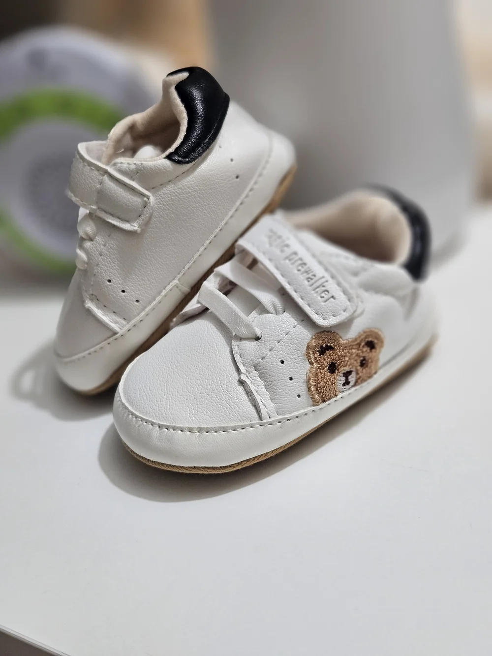 Classic White Kids Sneakers with Black Heel Accent